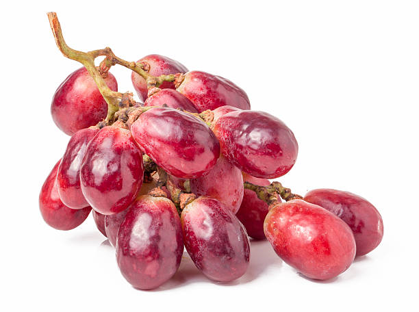 istock Ripe red grapes isolated on white background 516933304