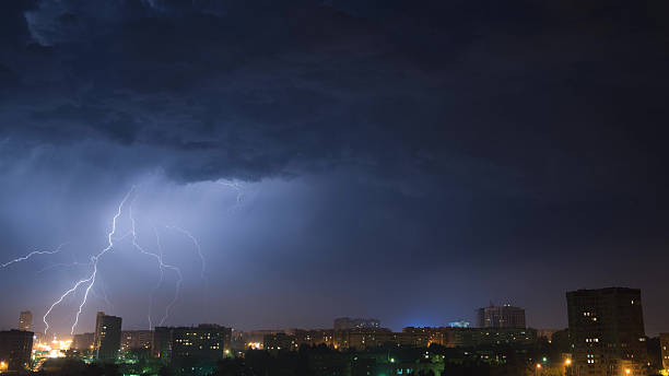 istock Night sky with lightning over the city 516933672