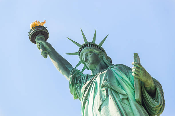 istock Statue of Liberty on a Sunny Day 516942793