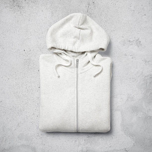 istock White hoodie on concrete background 516942861