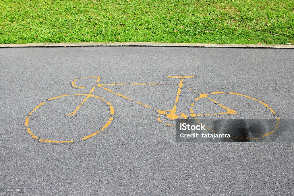 Bicycle lane (path) in the park Amusement Park Stock Photo