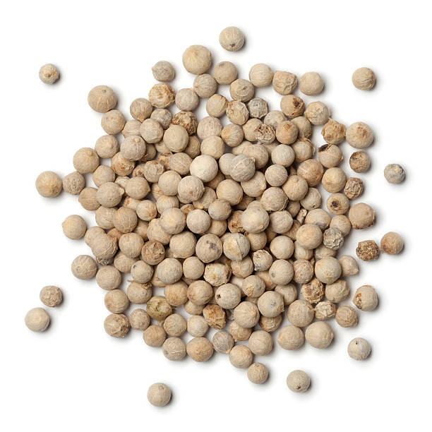 istock Heap of white peppercorns 516947418