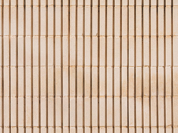 istock old beige wall of concrete blocks 516947876
