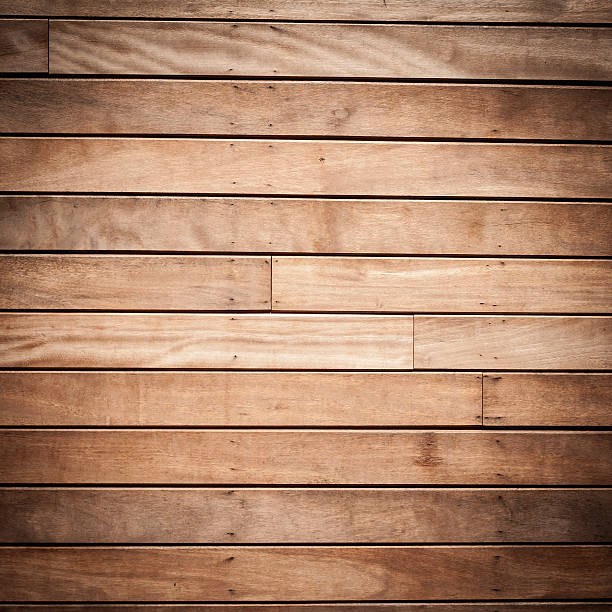 istock wooden planks background with black vignette borders 516947891