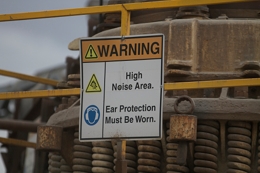 Safety Warning sign for high noise area with mandatory ear protection          