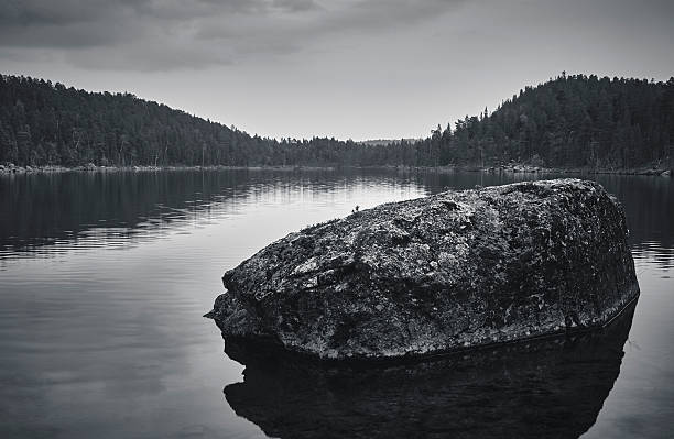 istock Large stone in the lake 516949299