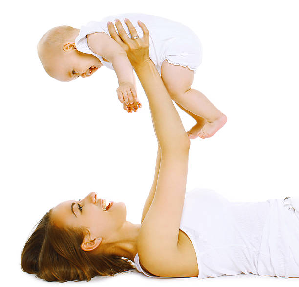 istock Mother holding baby, fun, exercise, leisure - concept 516950269