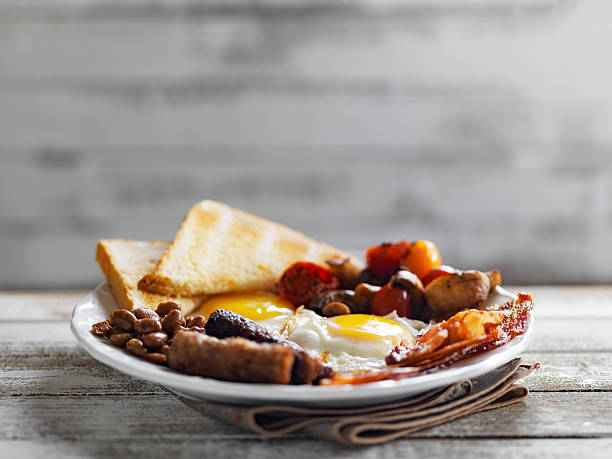 tasty english breakfast on rustic background tasty english breakfast on rustic background with copy space composition english breakfast stock pictures, royalty-free photos & images