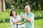 Senior couple riding bicycles