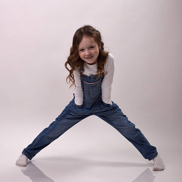 istock Girl on the slippery floor 516953104
