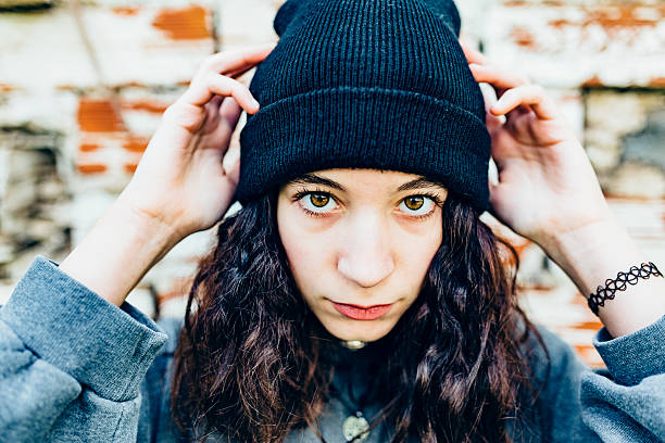 istock Sad girl leaning at wall 516954350