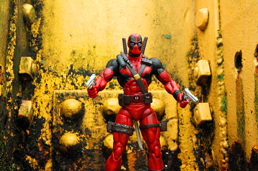 Vancouver, Canada - March 14, 2016: A model of the Marvel character  Wade Wilson, also known as Deadpool. Wilson is a mercenary who was transformed into Deadpool after illicit experimentation. The model is from the Marvel Select line of action figures. 