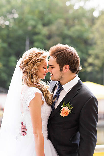 istock Bride and groom having a romantic moment on their wedding 516956096