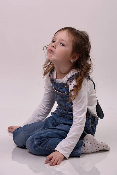 istock Girl puffed up her face 516956600