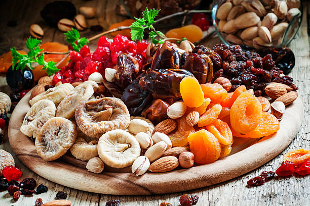 istock Mix dried fruits and nuts, healthy diet, eating lean 516956628