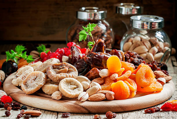 istock Mix dried fruits and nuts, healthy diet, eating lean 516957016