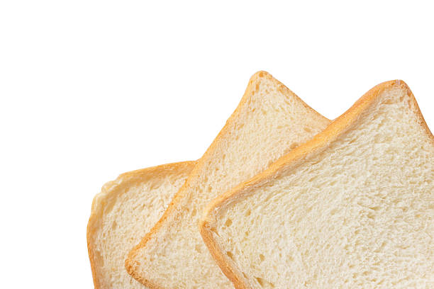 istock Slice of white bread isolated on white 516957518