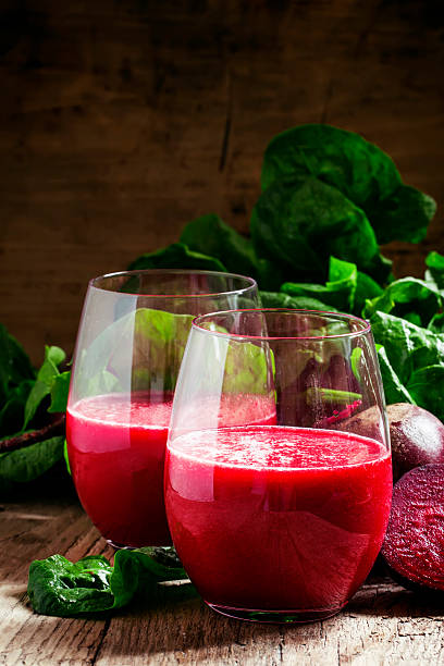 istock Beetroot smoothie in a large glass, fresh beets with tops 516960148