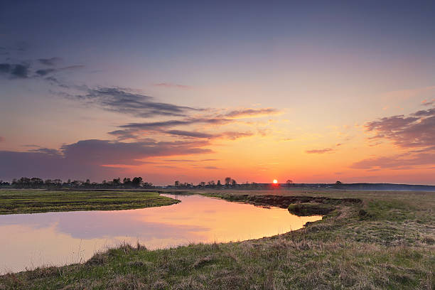 istock Spring countryside sunset over the river 516960250