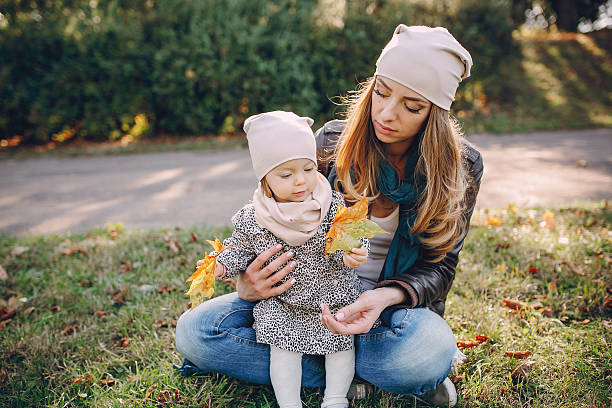 istock young family walking in the park 516961408