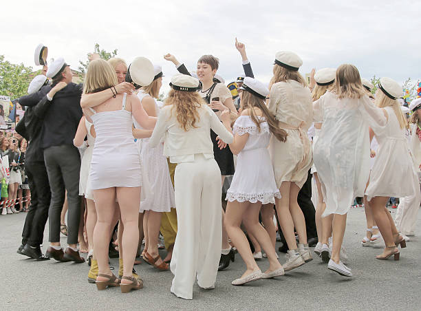 happy teenagers dancing at the graduation - studenter sweden bildbanksfoton och bilder