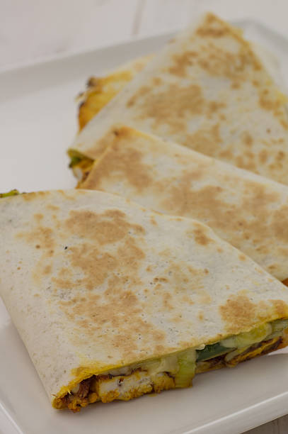 istock Mexican quesadillas with chicken, green beans and leek 516976772