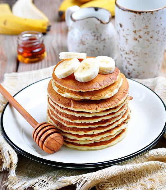 istock Vegetarian Pancake without eggs with organic agave syrup, bananas 516977772