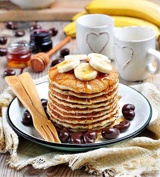Vegetarian Pancake without eggs with organic agave syrup, bananas