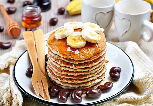 istock Vegetarian Pancake without eggs with organic agave syrup, bananas 516978316