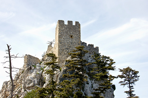Kyrenia, Cyprus - March 12, 2016: Saint Hilarion castle view in Northern Cyprus. The Saint Hilarion Castle lies on the Kyrenia mountain range, in Cyprus near Kyrenia. Saint Hilarion was built there in the 10th century. 