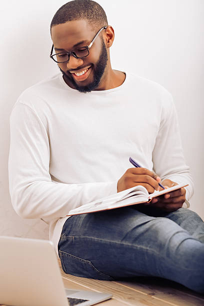 istock Afro American man at home 516979950