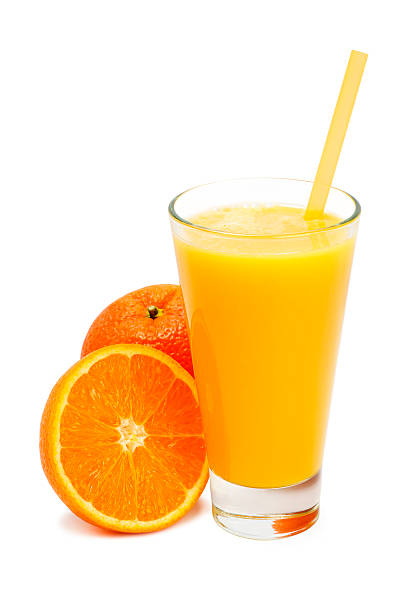 istock glass of freshly pressed orange juice isolated 516980756