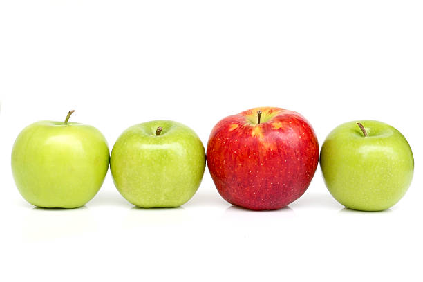 istock Green and red apples isolated on white background 516980821