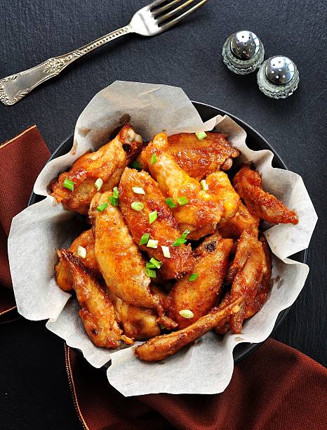 istock Chicken wings fried in soy sauce, rice vinegar, honey 516981306