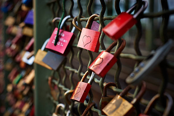 Love padlocks on the Hohenzollern Bridge in Cologne. More Thousand padlocks are there. People bring them to this place because it should bring luck in love an life.