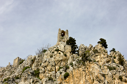 Kyrenia, Cyprus - March 12, 2016: Saint Hilarion castle view in Northern Cyprus. The Saint Hilarion Castle lies on the Kyrenia mountain range, in Cyprus near Kyrenia. Saint Hilarion was built there in the 10th century. 