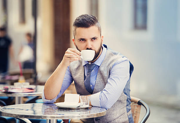 istock Hipster businessman in cafe 516982035