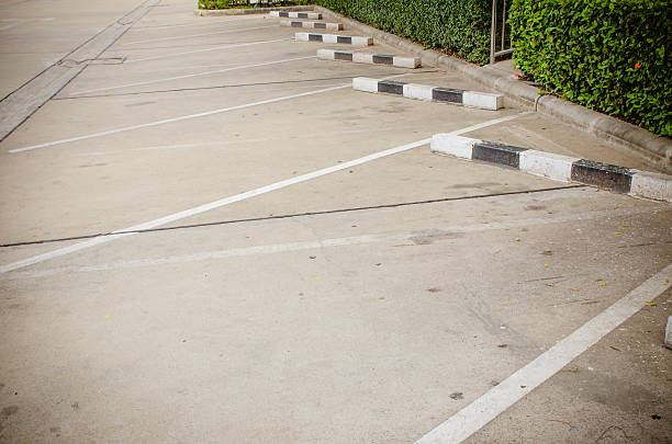 istock Parking lane outdoor in public park 516982199