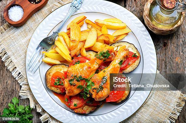 Braised Chicken In White Wine With Eggplant Tomato Stock Photo - Download Image Now