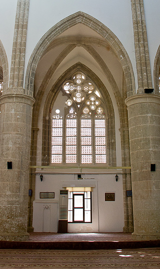 Famagusta, Cyprus - March 13, 2016: The Lala Mustafa Pasha interior view. The Mosque known as Saint Nicholas's Cathedral was built between 14th century as a church.  The cathedral was converted into a mosque after the Ottoman Empire period in 16th century and it remains a mosque to this day.