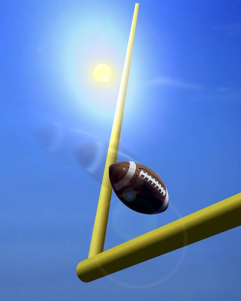 istock Football and Goal Post under  Sunlight 516984127