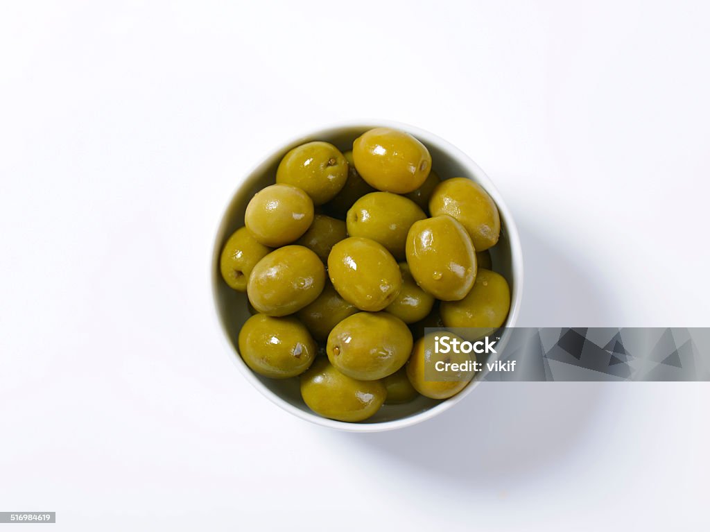 Brine-cured green olives Bowl of brine cured green olives Olive - Fruit Stock Photo