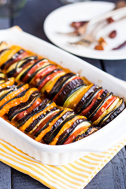 istock Ratatouille in white casserole on a dark background 516985461