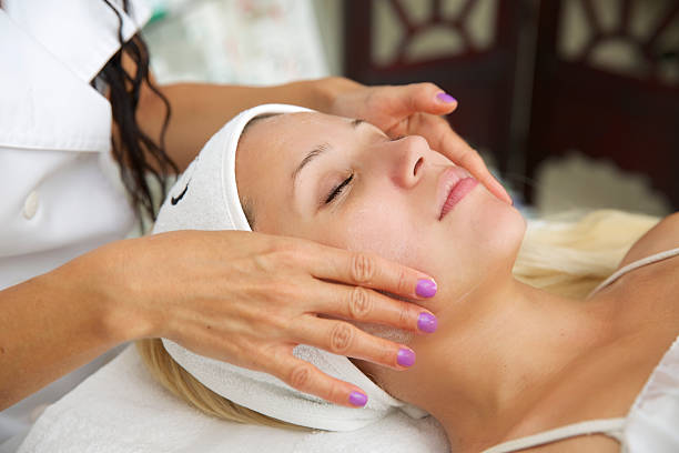 istock Beautiful young woman in the cosmetic table 516986522