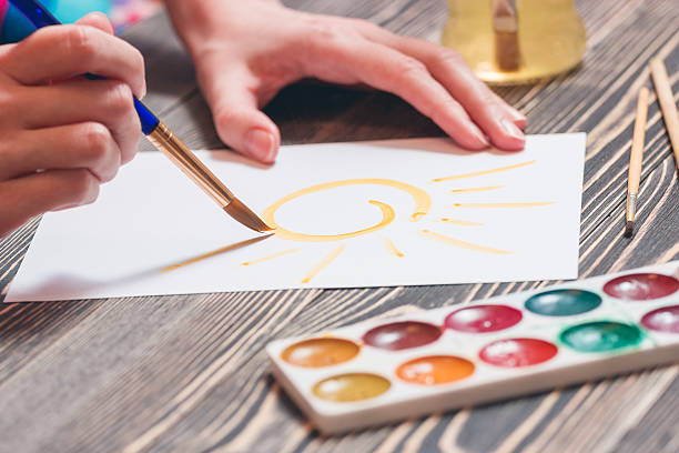 istock Woman painting a picture 516989636