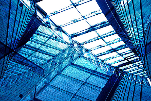 istock Double exposure photo of structural glass ceiling in modern building 516990762