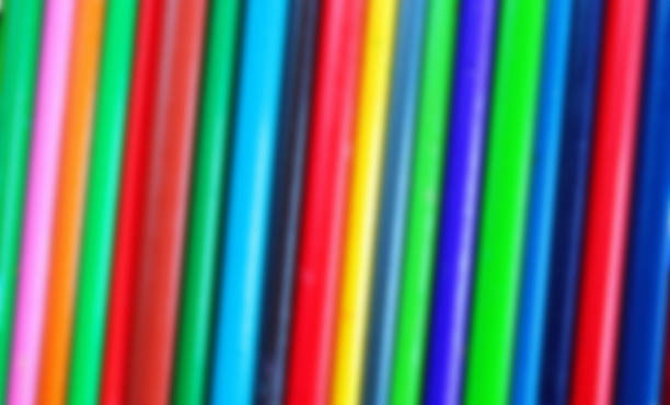 istock Abstract blurred colorful pencils background 516991030