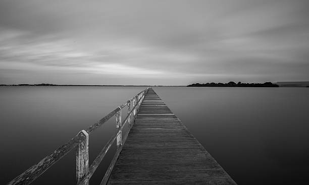 istock dark day on the jetty 517004136