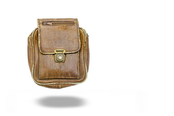 istock old leather haversack  isolated on white background 517008896