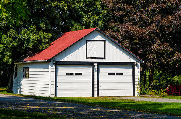 Detached garage Detached garage under trees detached house stock pictures, royalty-free photos & images